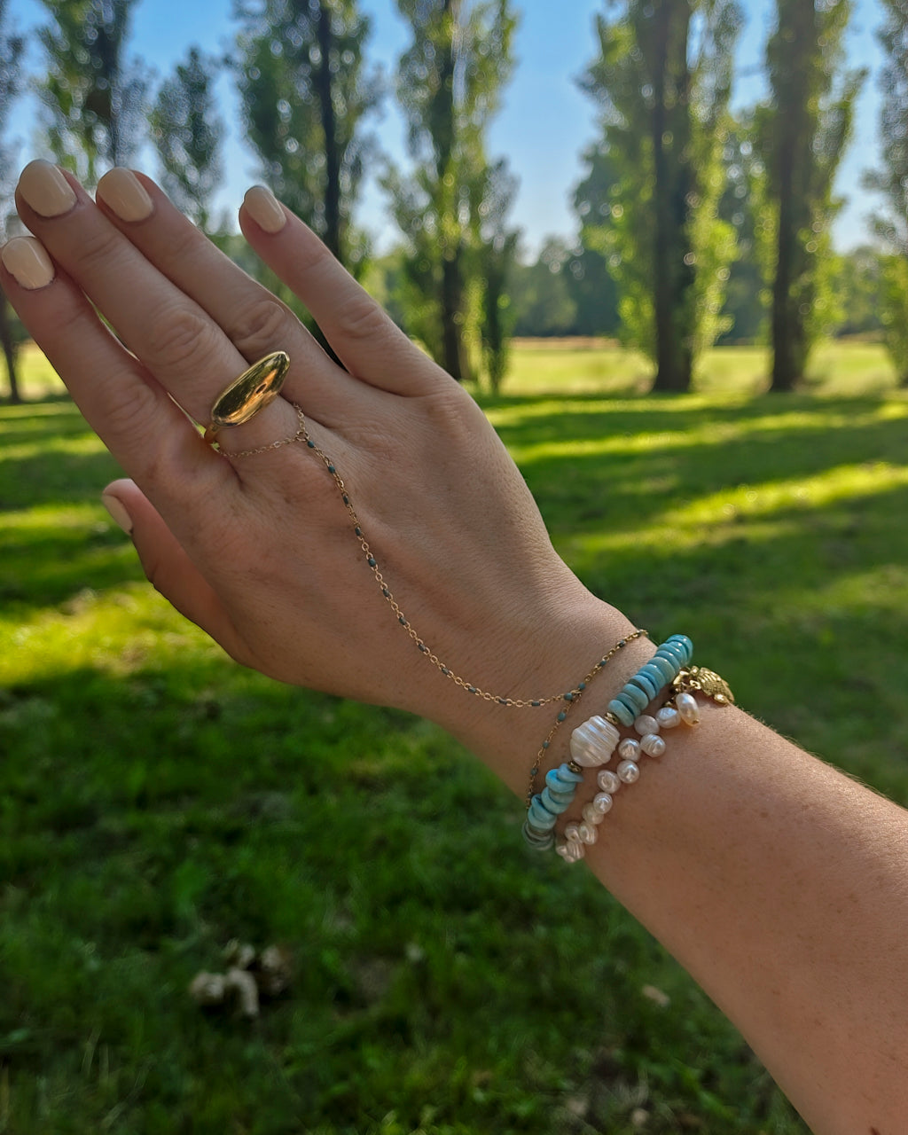 Handchain Sunset Heat Turquoise op model