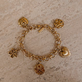 Coquette gouden bedelarmband uit de BLOSS Essentials collectie